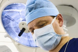 look of surgeon with lamp